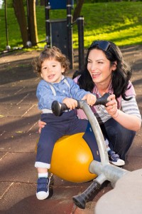 Encourage your toddler to step outside their comfort zone. If, for example, they are hesitant about getting onto a see-saw at the park, stand behind them and hold them so that they know they are safe. 